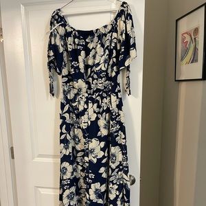 Stunning Navy Jumpsuit with white flowers accent